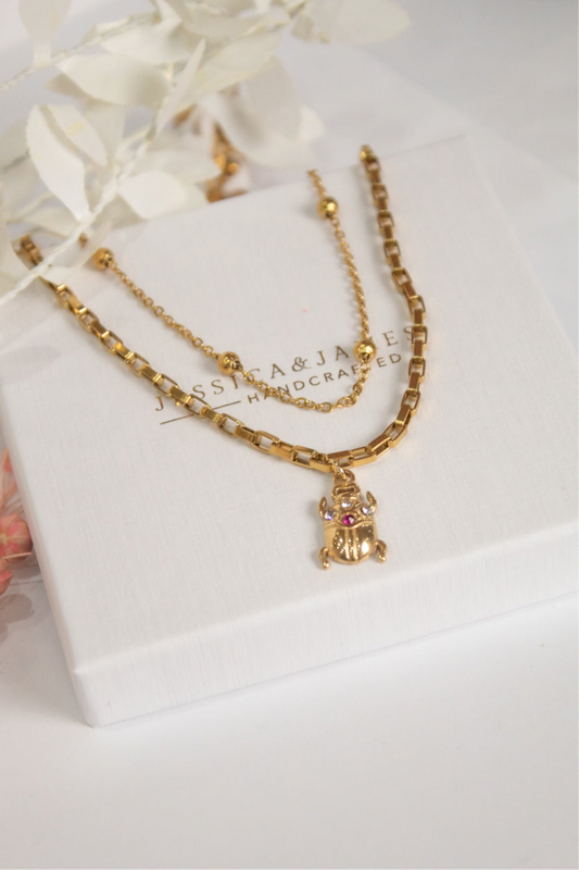 Egyptian beetle goddess necklace in gold