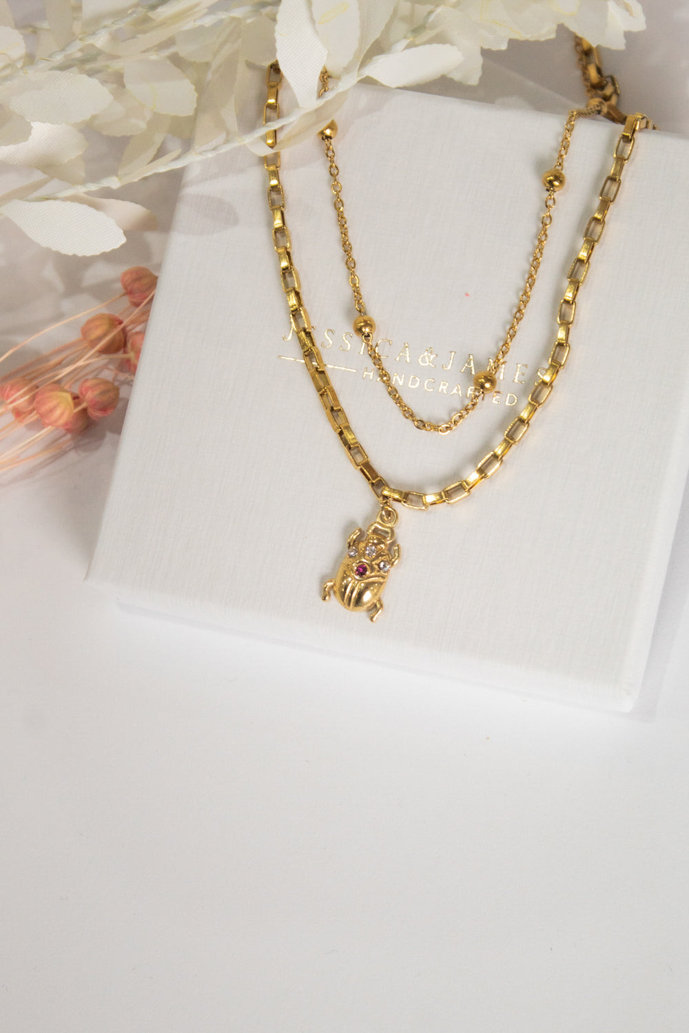 Egyptian beetle goddess necklace in gold