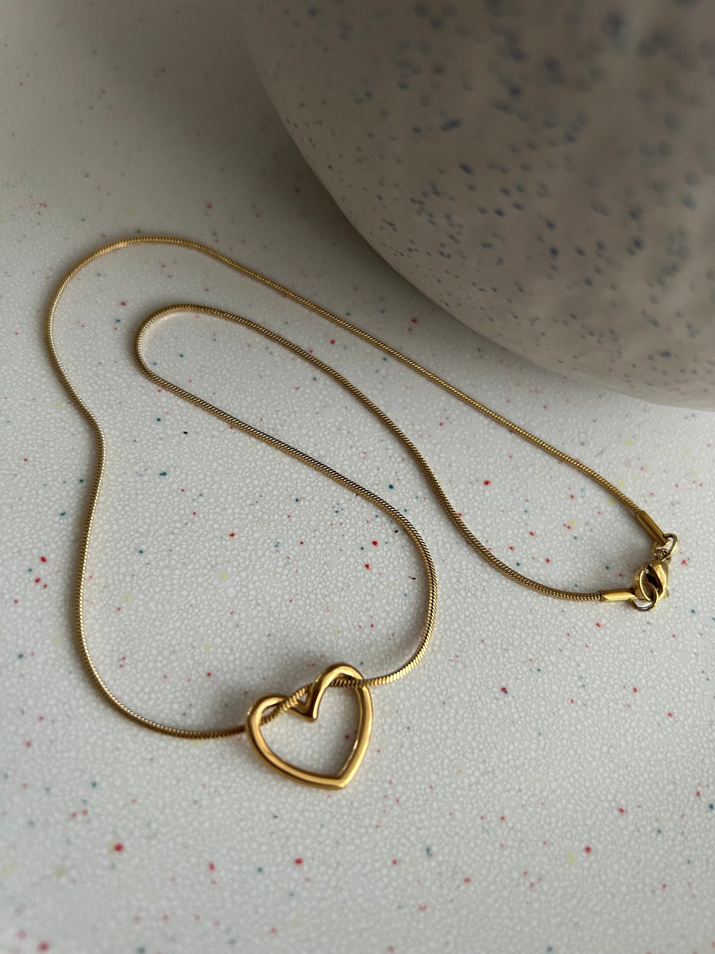 Floating love entwined heart necklace