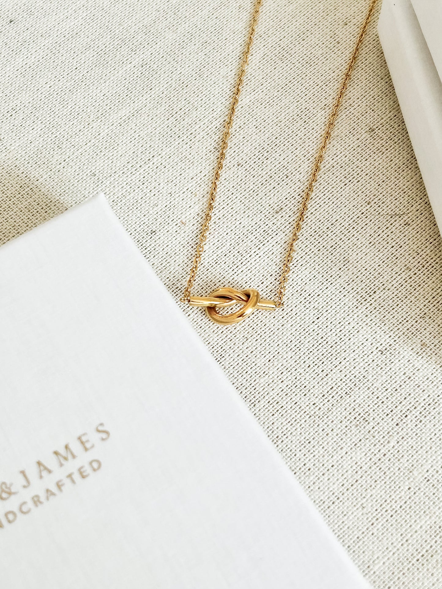 Love knot of life necklace in gold