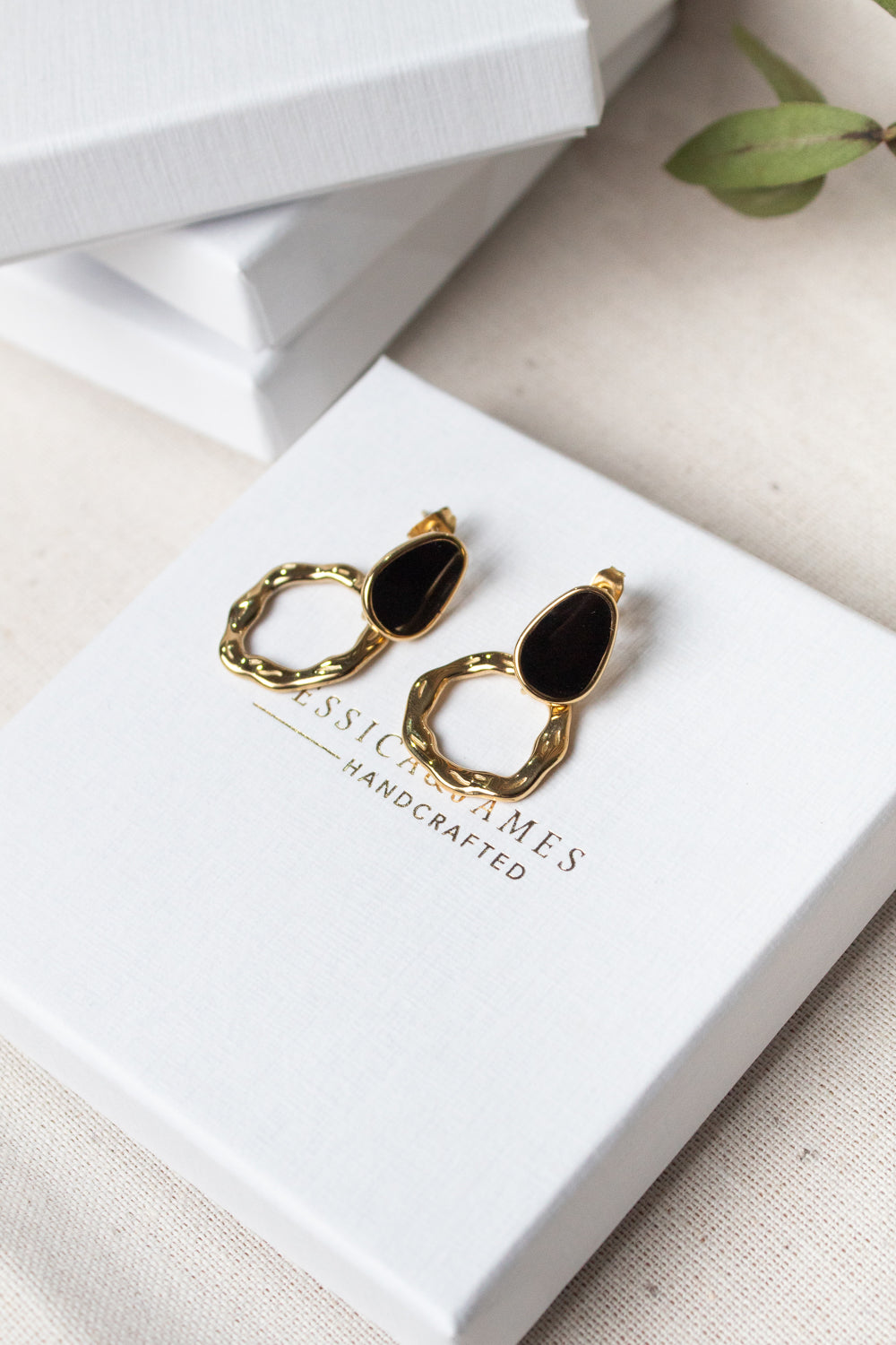 Enamel wave earrings in gold