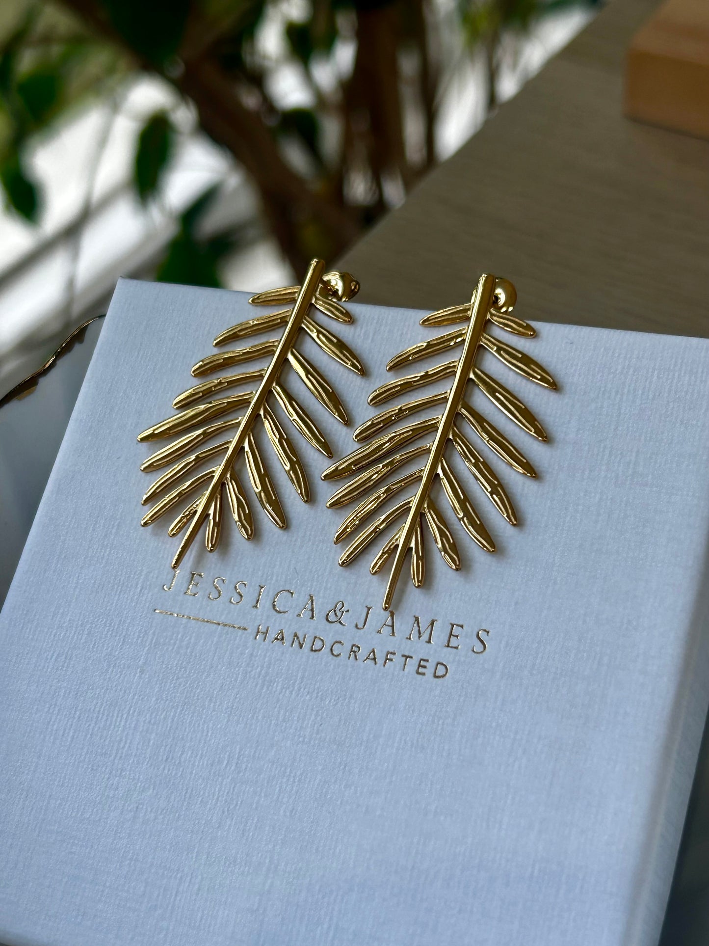 Statement Feather leaf earrings - revitalise & growth