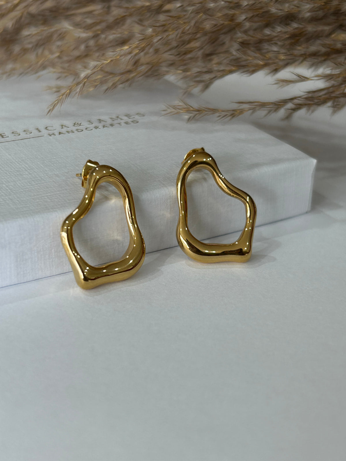 Molten Pear Abstract gold earrings