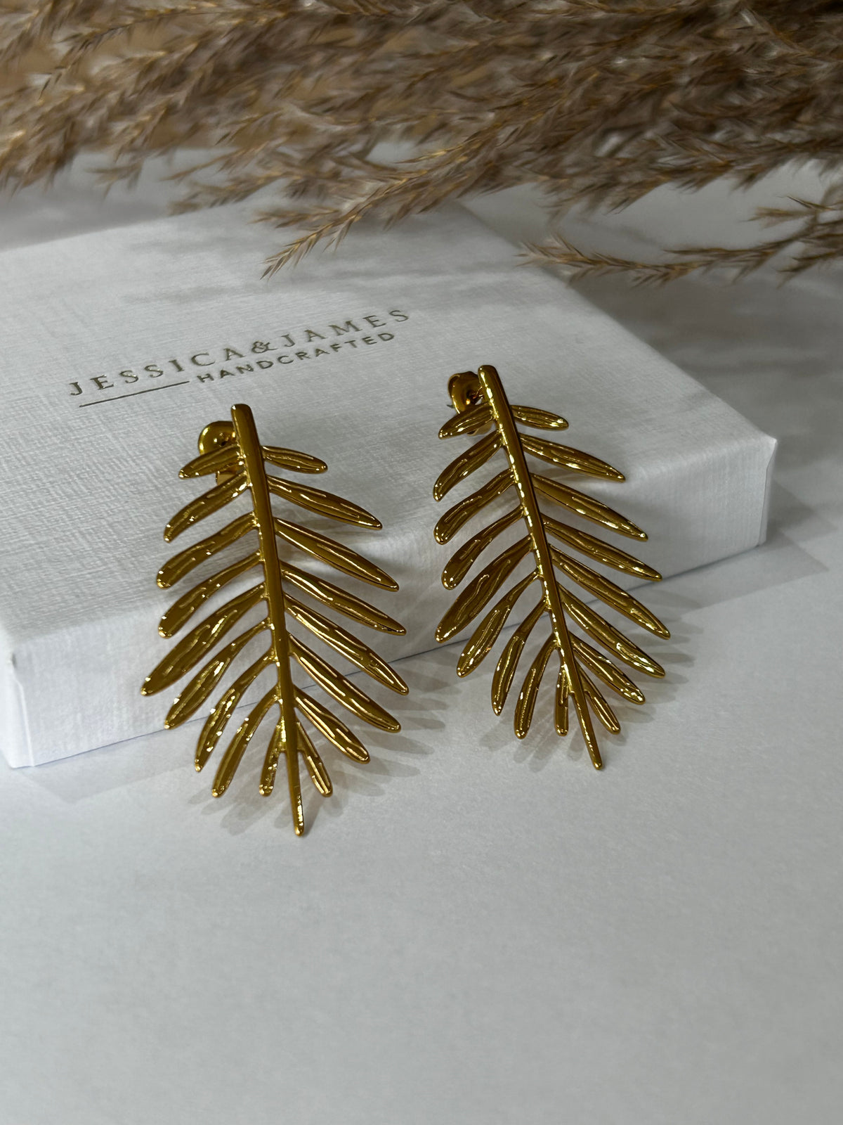 Statement Feather leaf earrings - revitalise & growth