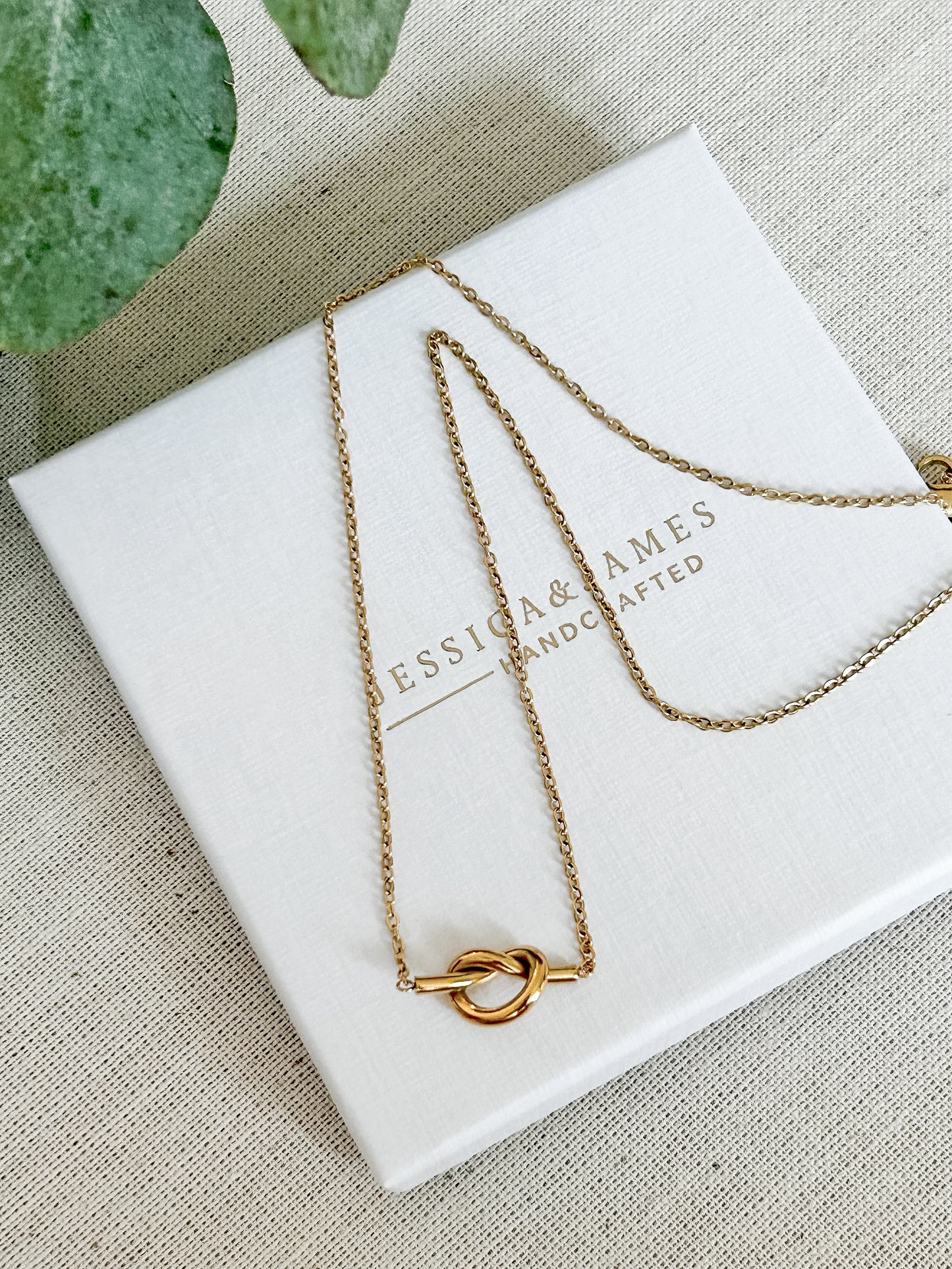 Love knot of life necklace in gold