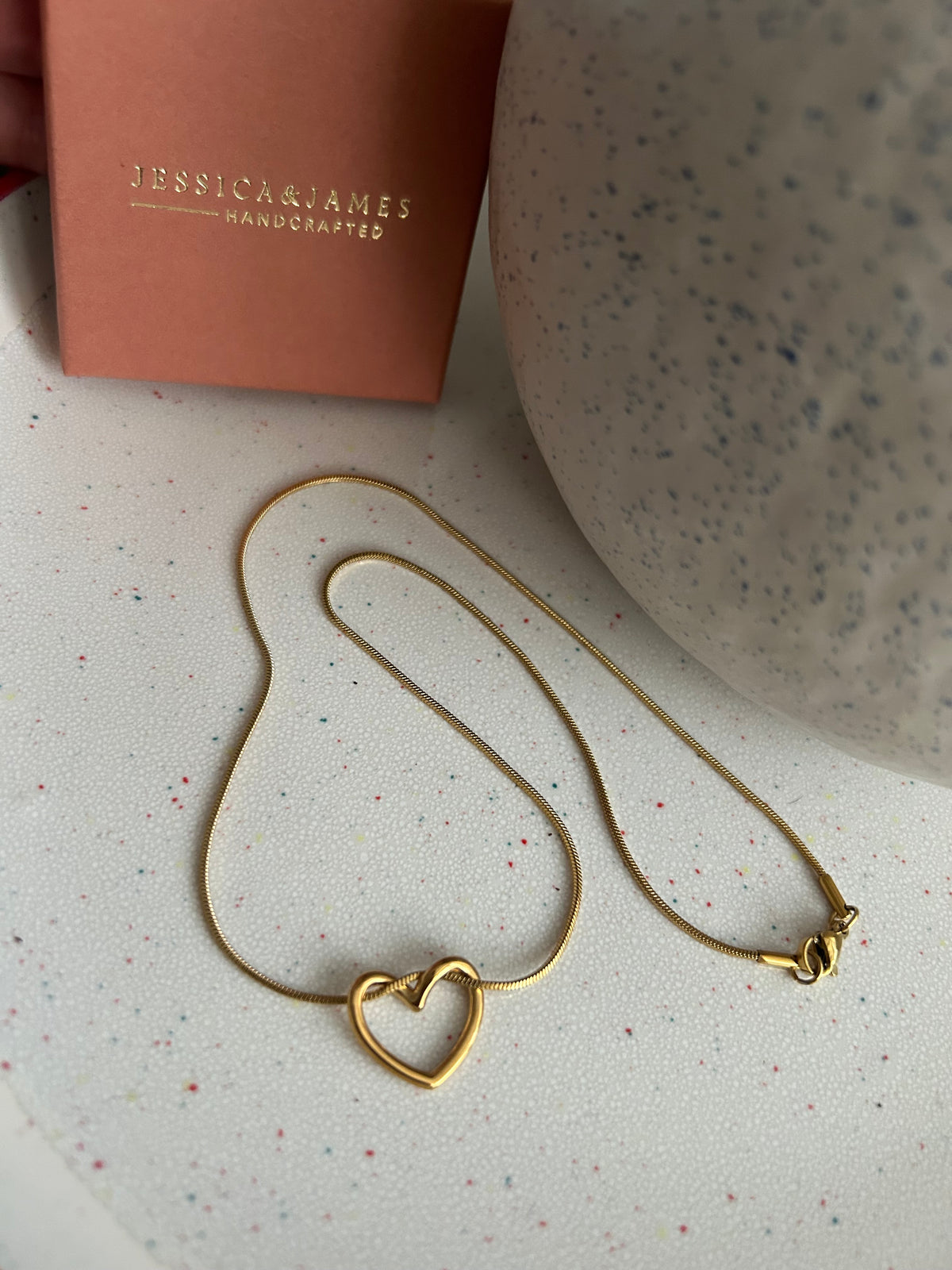 Floating love entwined heart necklace
