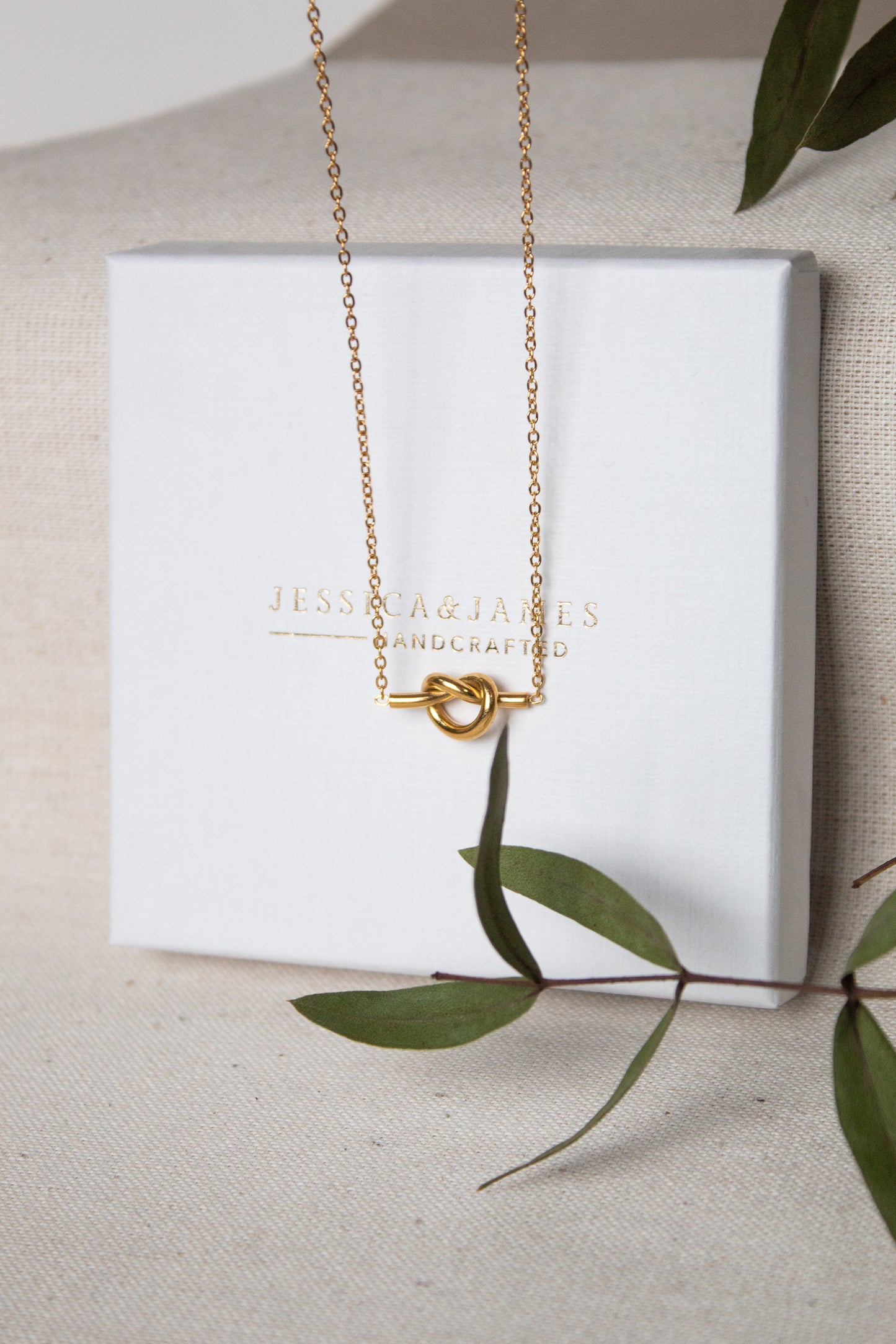 Love knot of life necklace in gold