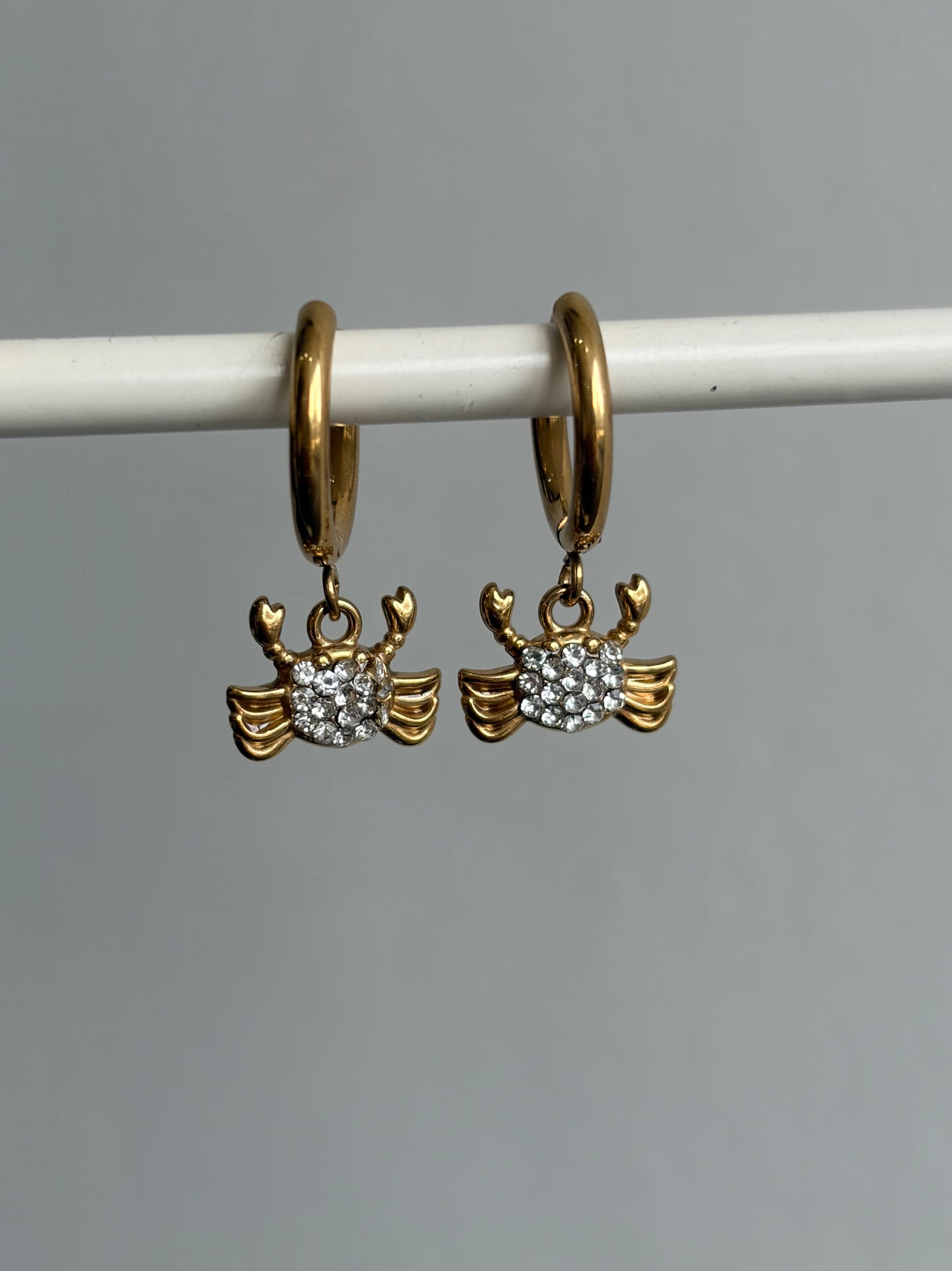 Gold crab hoop earrings