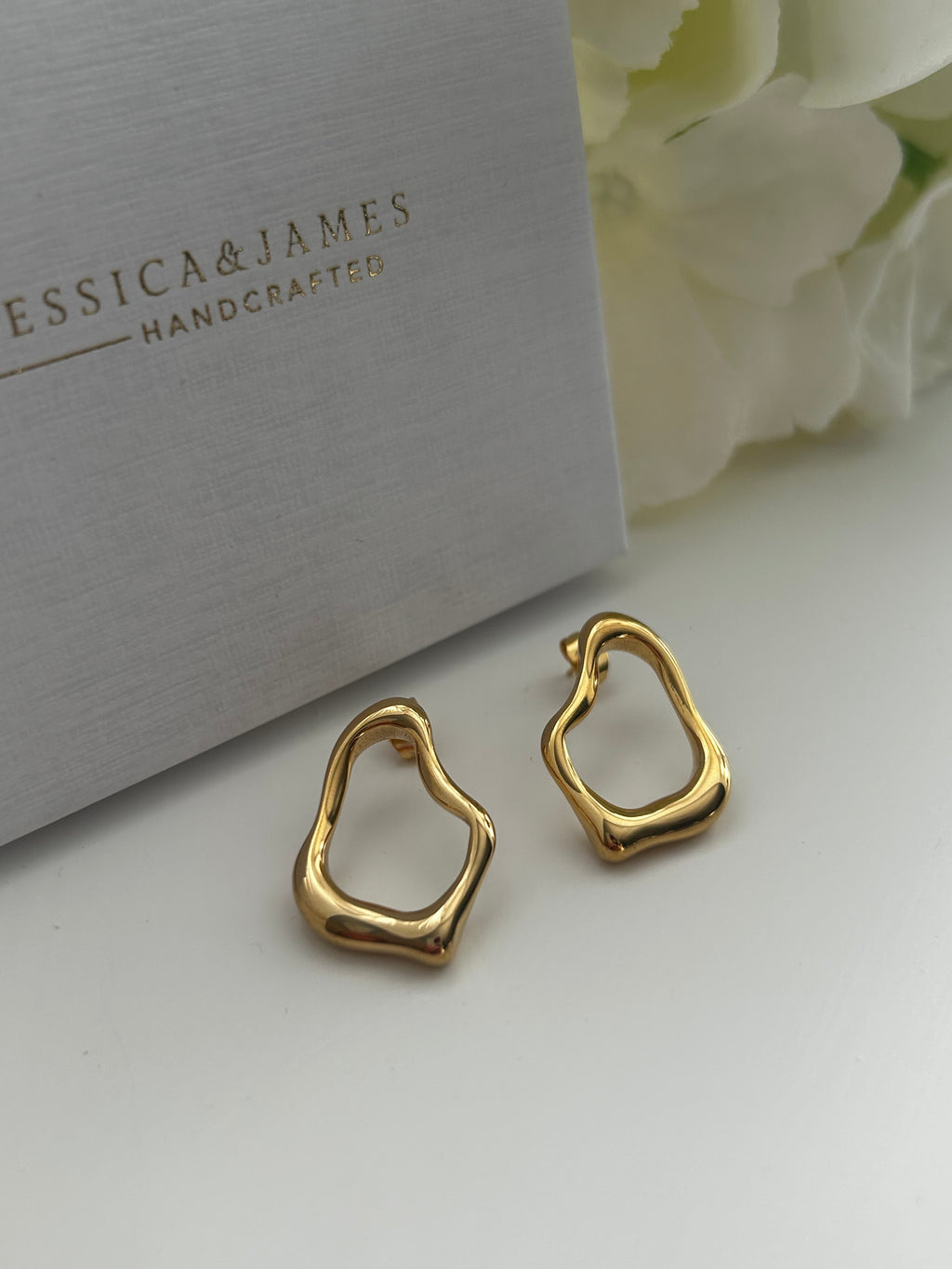 Molten Pear Abstract gold earrings
