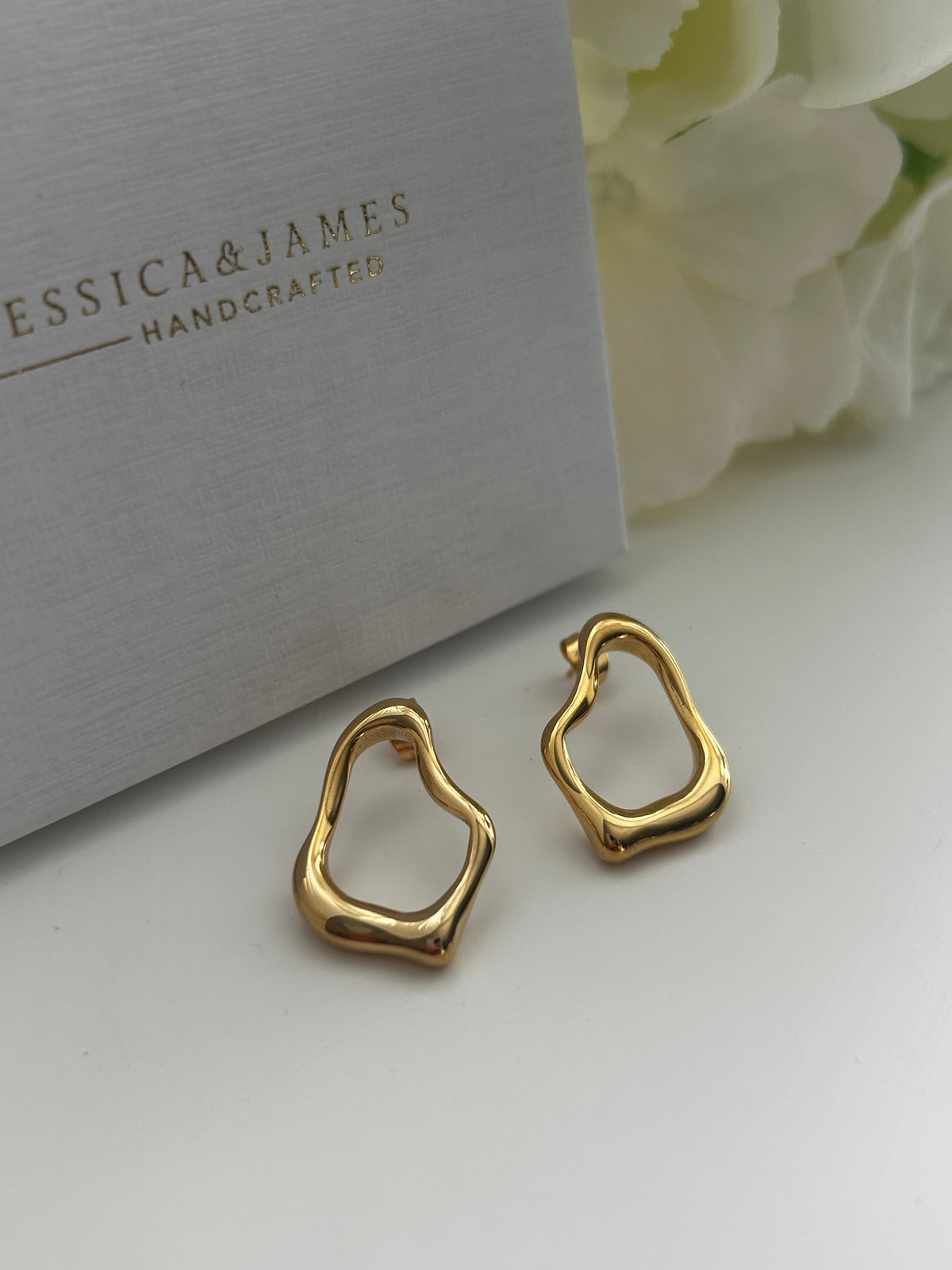 Molten Pear Abstract gold earrings