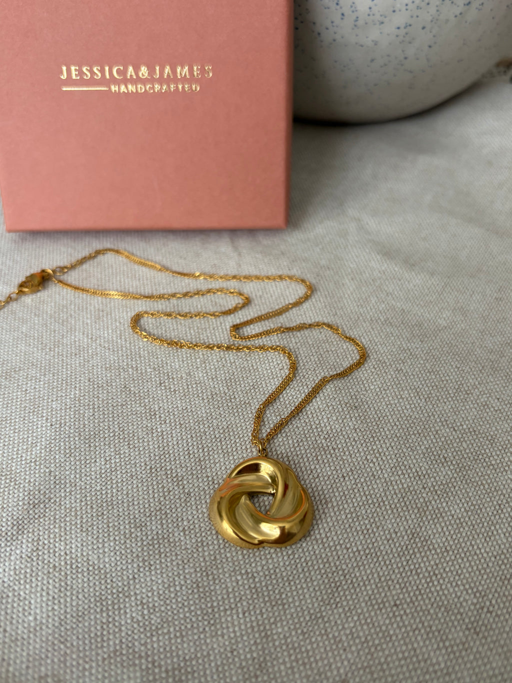 Life knot gold necklace