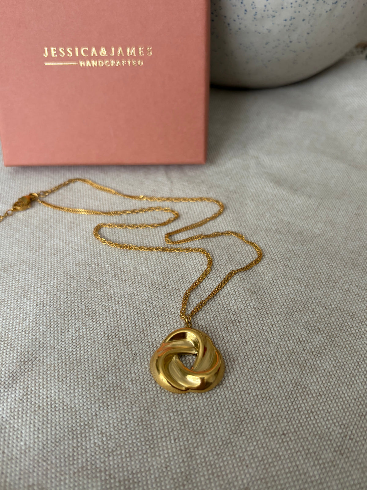 Life knot gold necklace