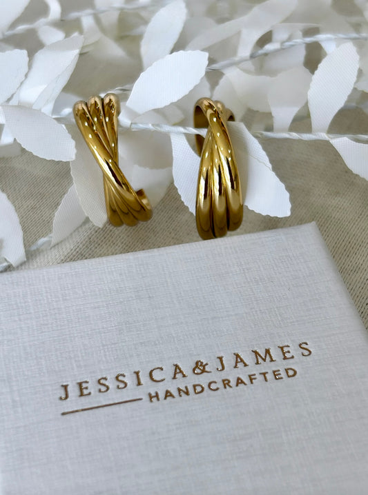 Twist hoop earrings in Gold