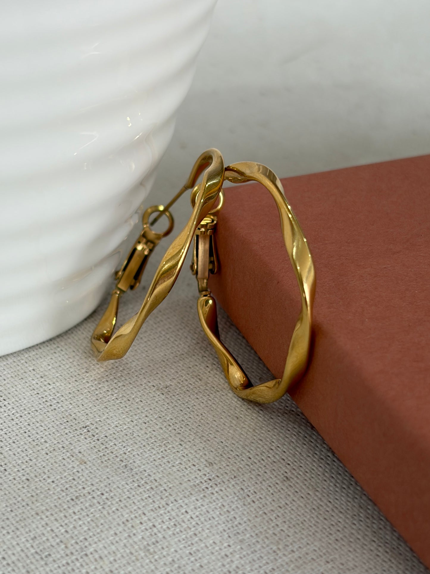Waterproof gold twisted hoop earrings by Jessica and James jewellery