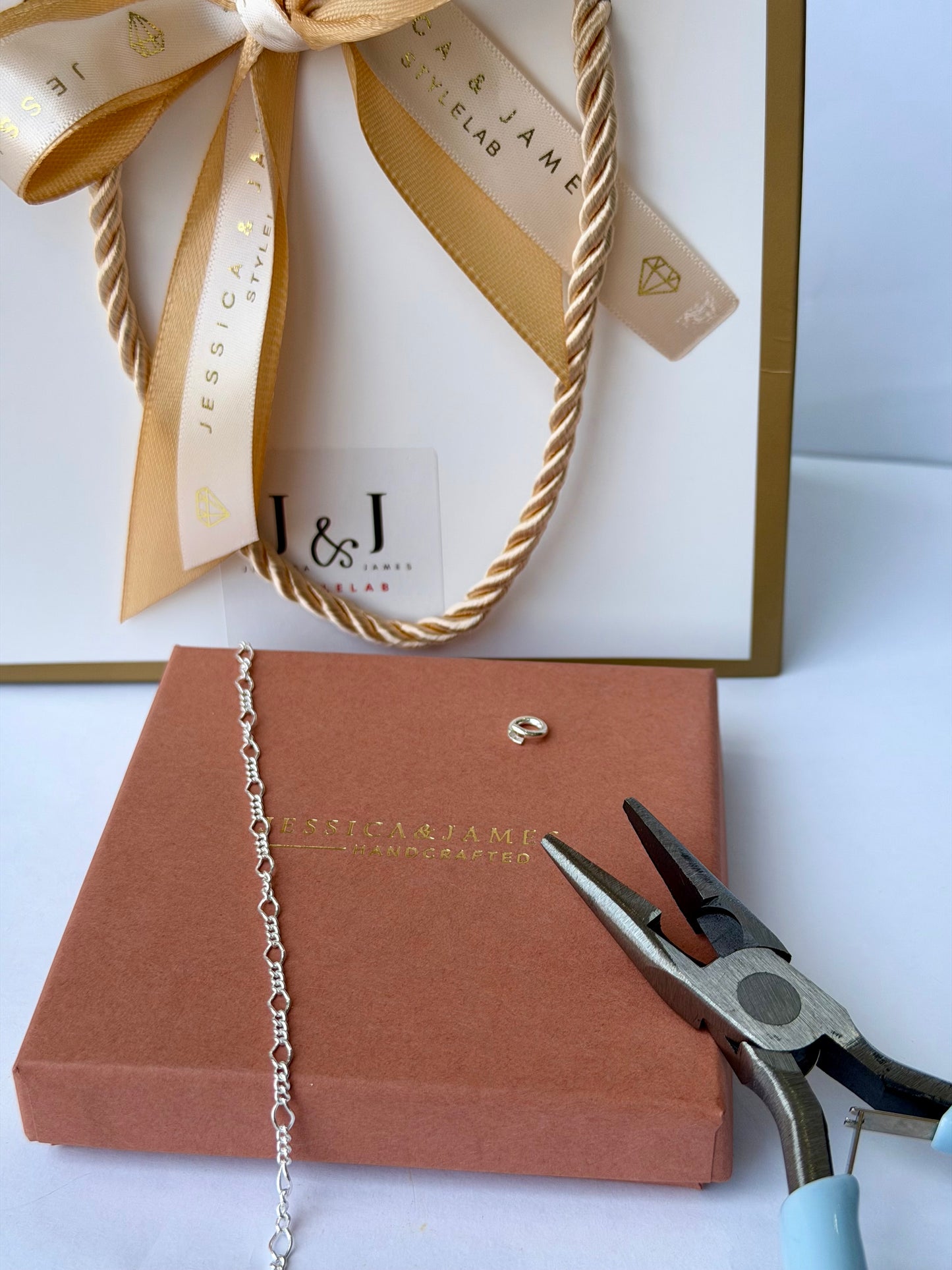 Permanent bracelet chain and clasp detail, sterling silver