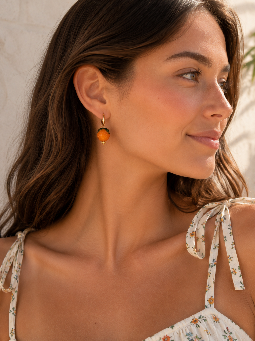 Orange huggie hoop earrings