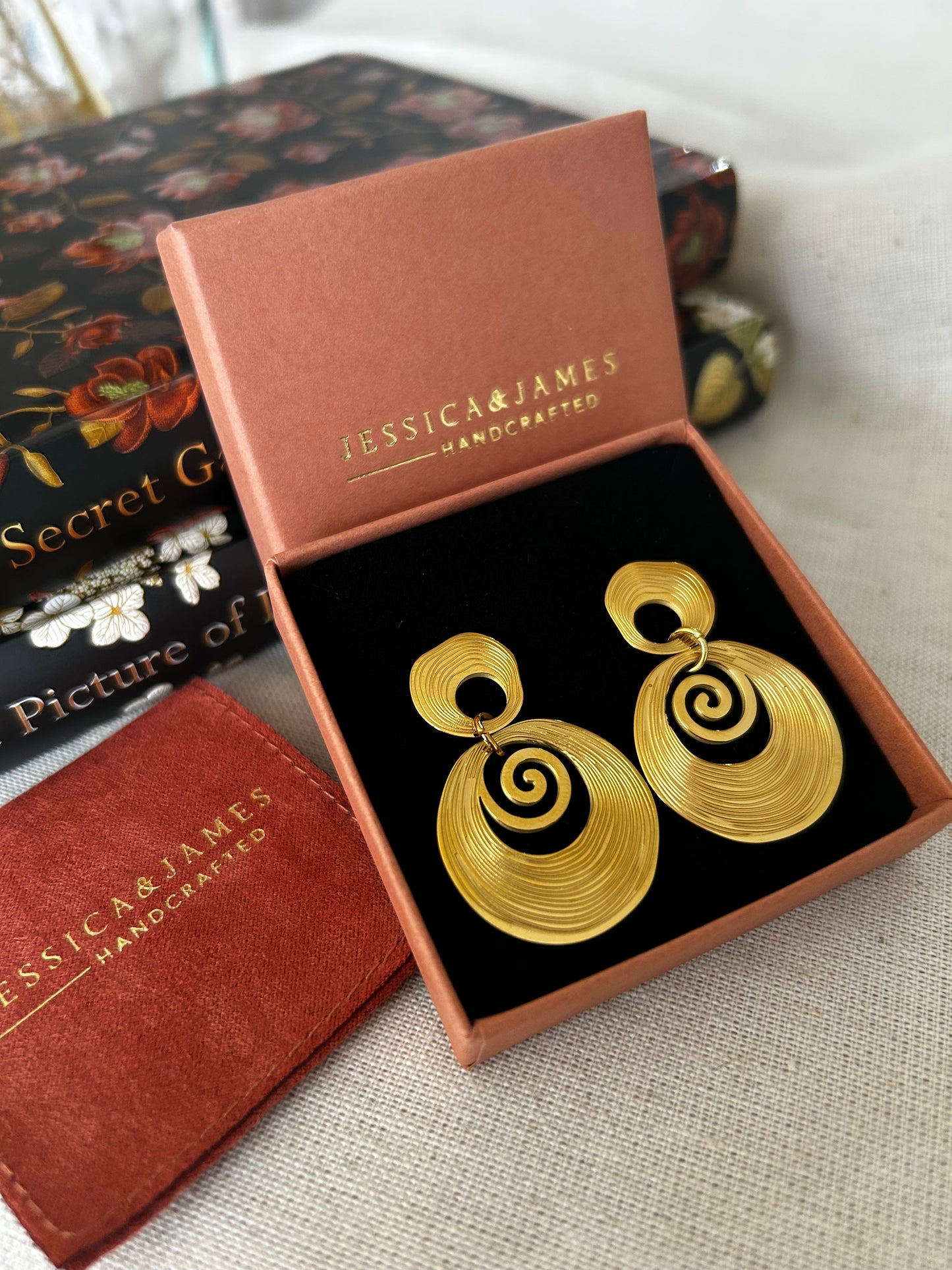 Diamond cut spiral galaxy earrings