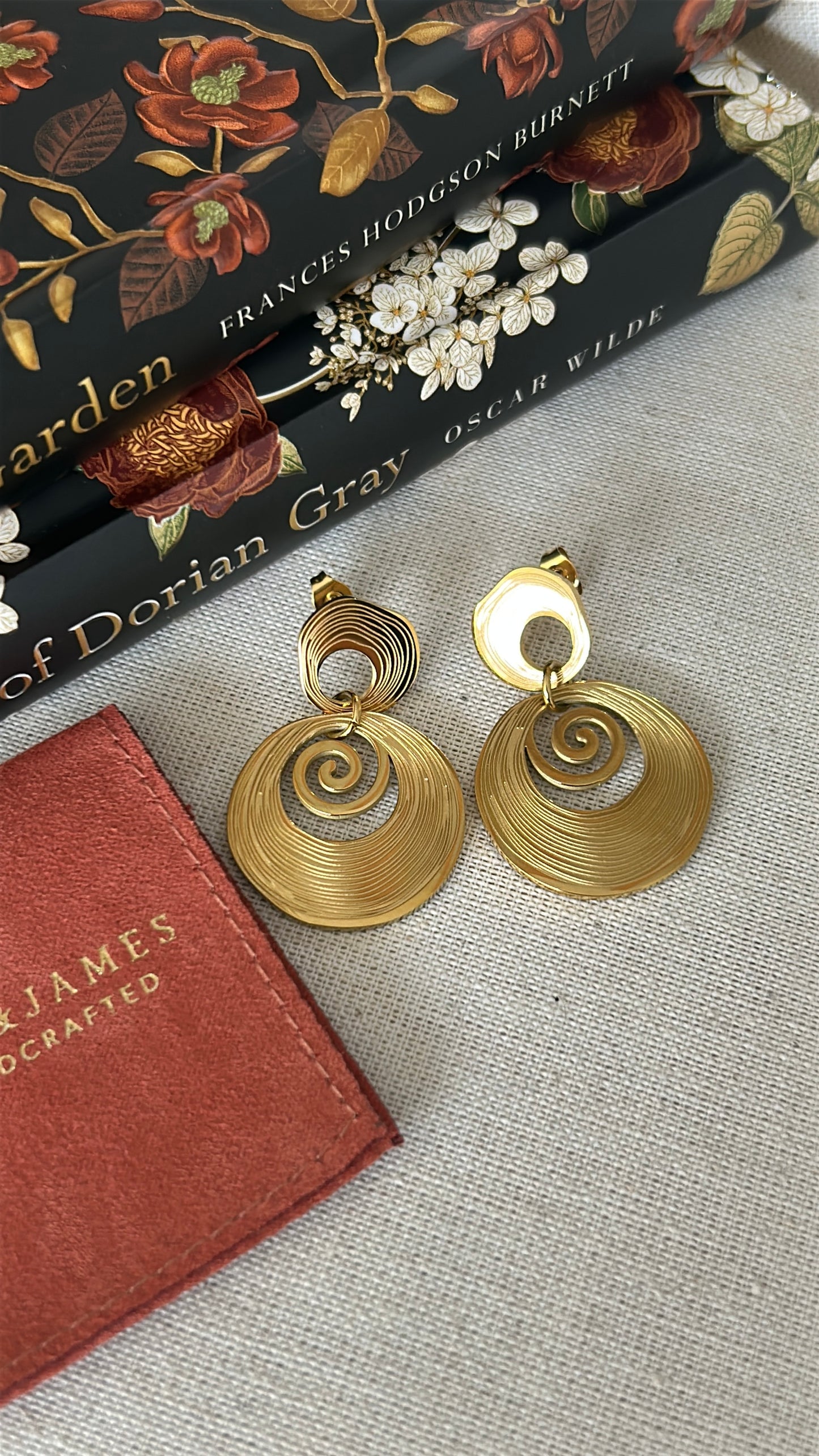 Diamond cut spiral galaxy earrings