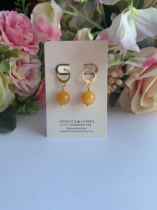 Natural calcite sun globe earrings